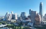 panoramic view of high-rises and skyscrapers in downtown Austin, Texas, on the north shore of the colorado river