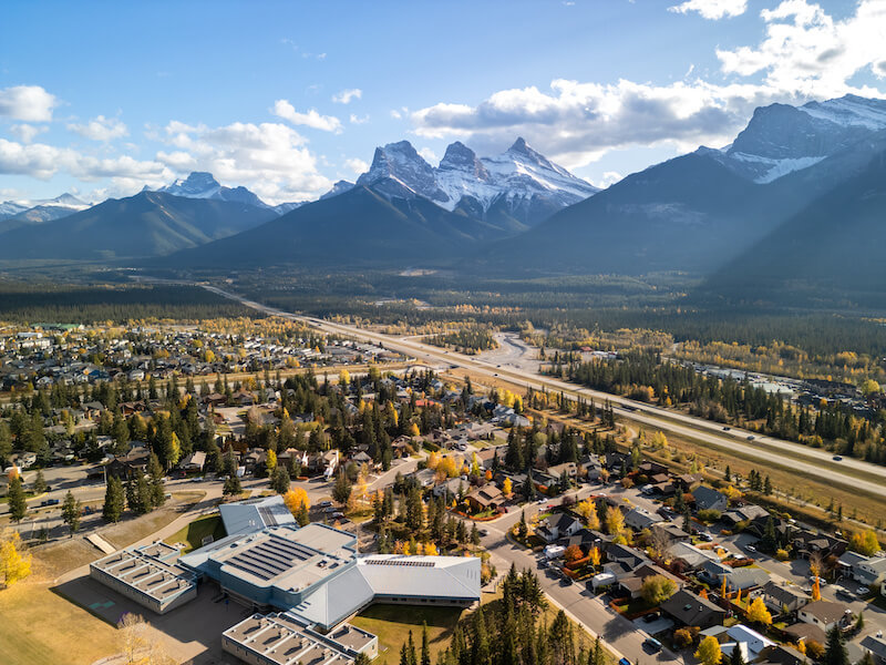 Aerial View of Canmore and Three Sisters Mountain Peaks